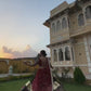 A vibrant traditional Navratri Gujarati lehenga with intricate mirror work and a canvas patta border is showcased. The lehenga features a stunning combination of black, red, and yellow hues with a 4-meter flair. The video captures the detailed embroidery, rich fabric textures, and elegant drape of the outfit, highlighting its festive appeal.
